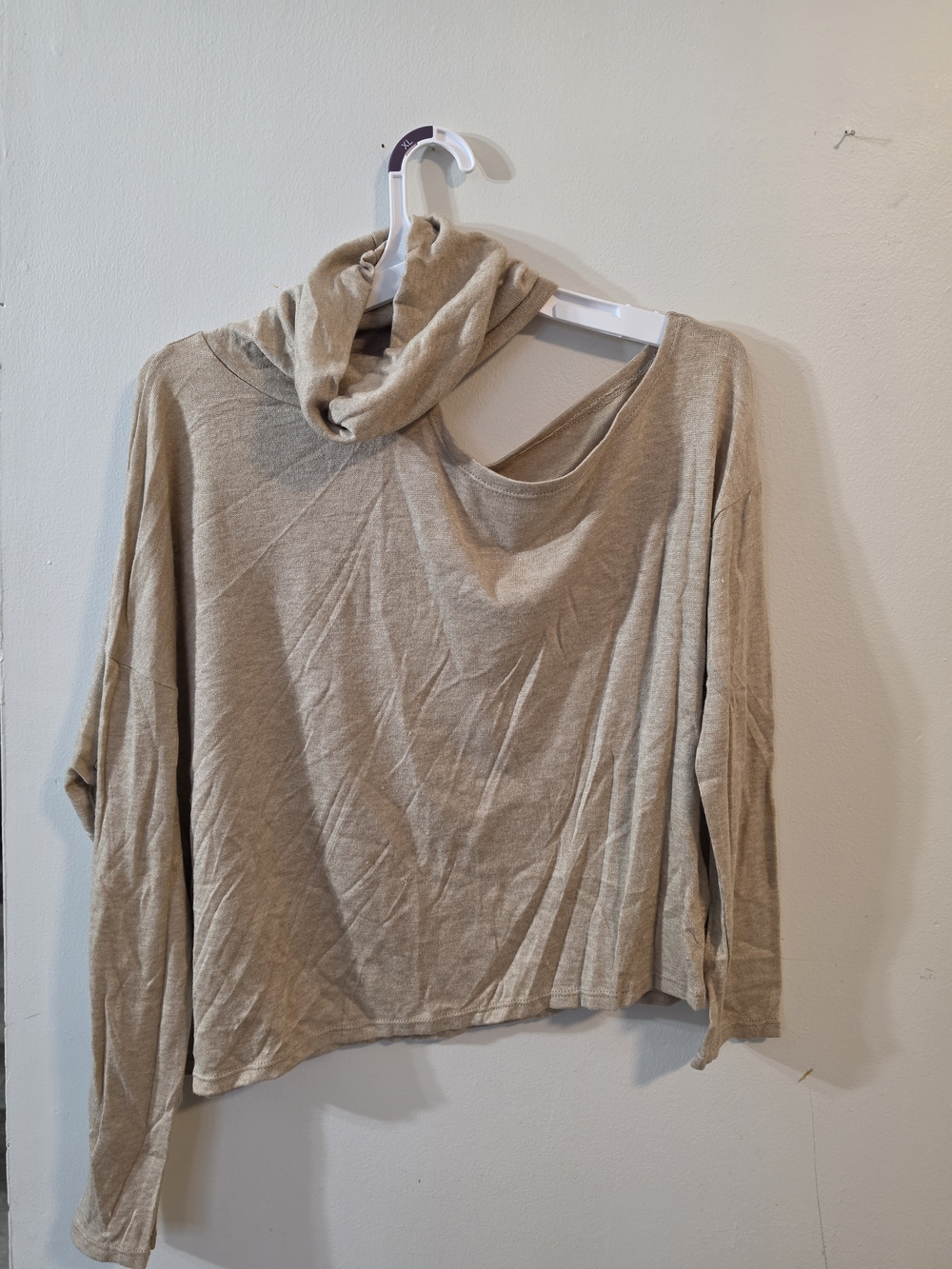 Relaxed Cutout Turtleneck Sweater in Beige